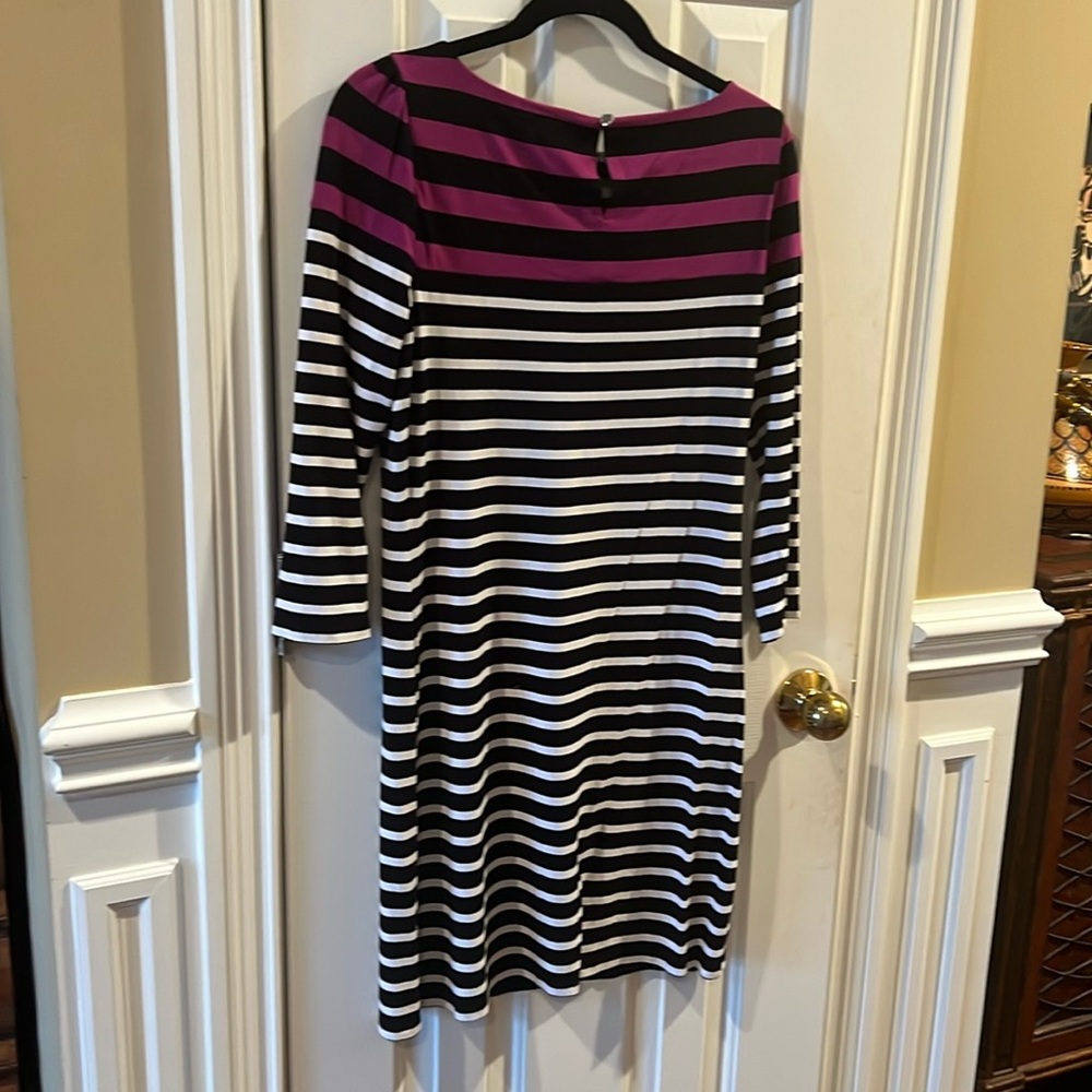 Great little dress / never worn. 37.” Long Fabric has some stretch